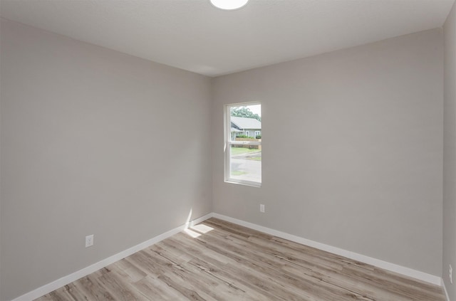3308 Cambridge St, Des Moines, IA 50313 - spare room featuring light wood finished floors and baseboards