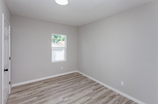 3308 Cambridge St, Des Moines, IA 50313 - empty room with light wood-style flooring and baseboards