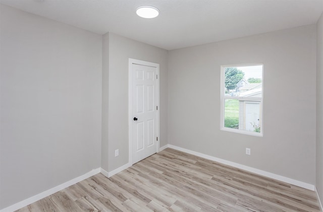3308 Cambridge St, Des Moines, IA 50313 - unfurnished room with light wood-style flooring and baseboards
