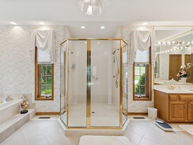501 S 33rd St, West Des Moines, IA 50265 - full bathroom featuring tile patterned flooring, wallpapered walls, vanity, a stall shower, and a ceiling fan