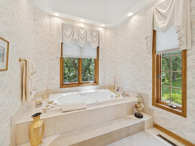 501 S 33rd St, West Des Moines, IA 50265 - bathroom with healthy amount of natural light, a whirlpool tub, wallpapered walls, tile patterned floors, and recessed lighting