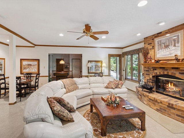 501 S 33rd St, West Des Moines, IA 50265 - living area featuring light carpet, ornamental molding, ceiling fan, a fireplace, and recessed lighting