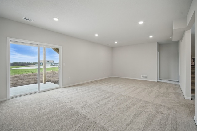 4270 Grover Woods Ln, Des Moines, IA 50317 - empty room featuring light carpet and recessed lighting