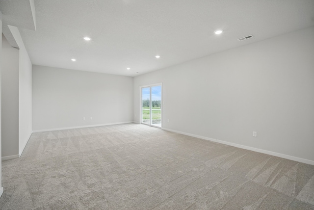 4270 Grover Woods Ln, Des Moines, IA 50317 - empty room with recessed lighting and light carpet