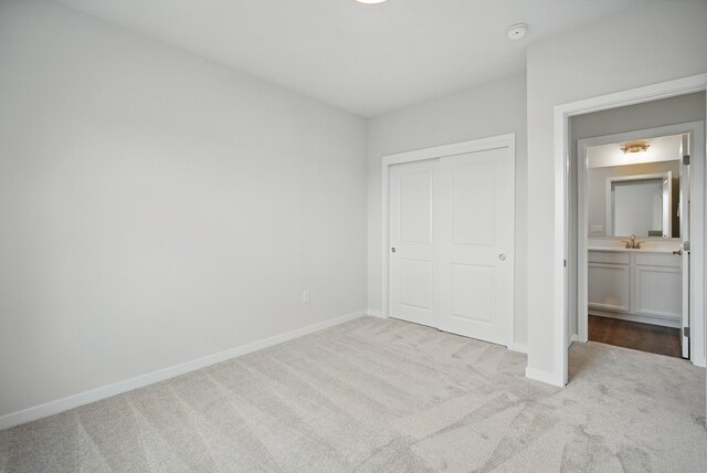 4270 Grover Woods Ln, Des Moines, IA 50317 - unfurnished bedroom featuring carpet and a closet