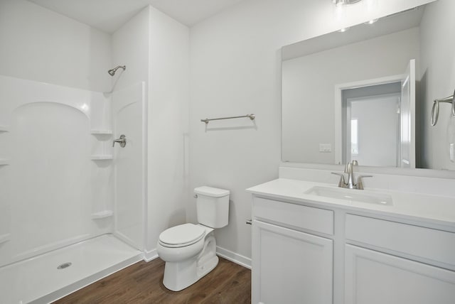 4270 Grover Woods Ln, Des Moines, IA 50317 - bathroom with vanity, wood finished floors, and a shower