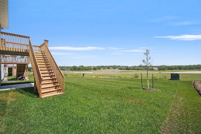 4270 Grover Woods Ln, Des Moines, IA 50317 - view of grassy yard featuring stairway and a deck