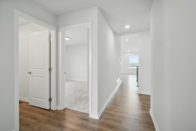 4270 Grover Woods Ln, Des Moines, IA 50317 - corridor featuring dark wood-style floors and recessed lighting