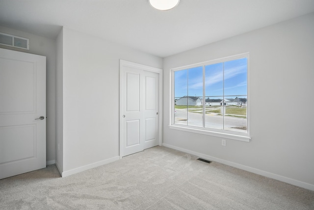 4270 Grover Woods Ln, Des Moines, IA 50317 - unfurnished bedroom with carpet and baseboards