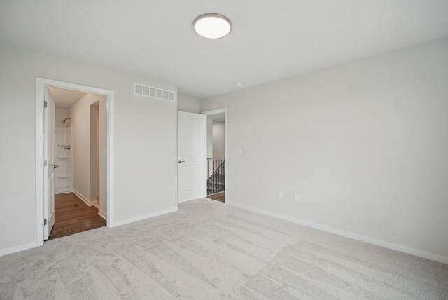 4270 Grover Woods Ln, Des Moines, IA 50317 - unfurnished bedroom with carpet and baseboards