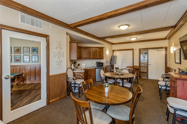 1250 SW Magazine Rd Unit 215, Ankeny, IA 50023 - dining room with a wainscoted wall, dark colored carpet, and beamed ceiling