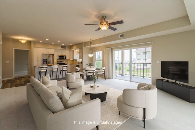 1250 SW Magazine Rd Unit 215, Ankeny, IA 50023 - living room featuring a ceiling fan and recessed lighting