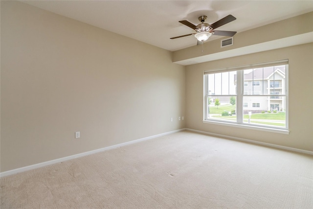 1250 SW Magazine Rd Unit 215, Ankeny, IA 50023 - spare room featuring light colored carpet and ceiling fan