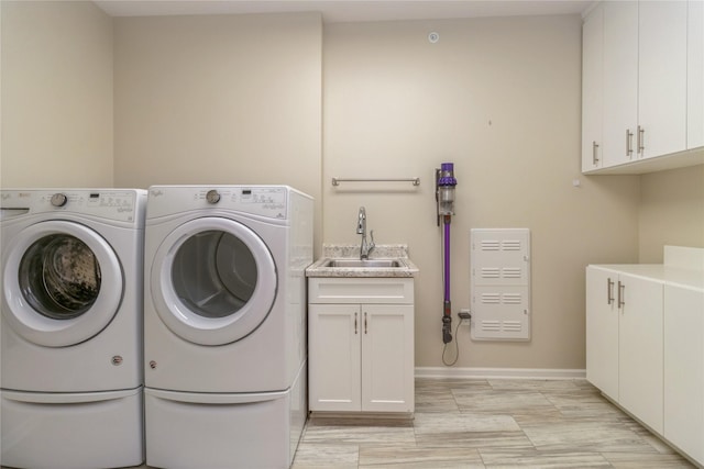 1250 SW Magazine Rd Unit 215, Ankeny, IA 50023 - laundry room featuring cabinet space and separate washer and dryer