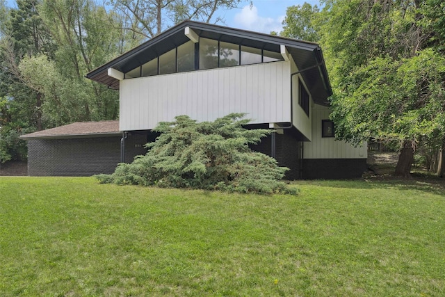 1808 80th St, Windsor Heights, IA 50324 - view of property exterior featuring a yard