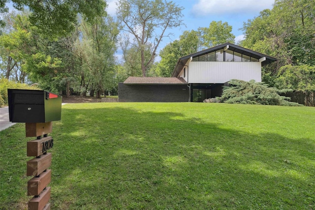 1808 80th St, Windsor Heights, IA 50324 - view of grassy yard with mail area