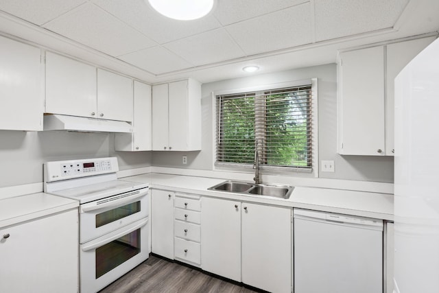 1808 80th St, Windsor Heights, IA 50324 - kitchen with white appliances, under cabinet range hood, light countertops, and white cabinetry