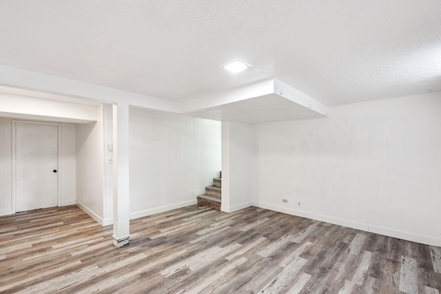 1808 80th St, Windsor Heights, IA 50324 - finished below grade area featuring wood finished floors and stairs