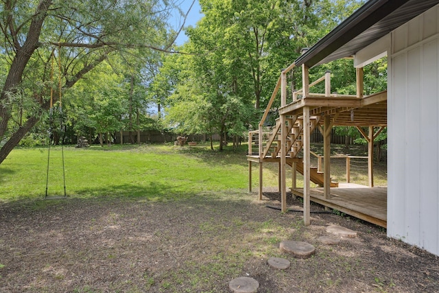 1808 80th St, Windsor Heights, IA 50324 - fenced backyard featuring a wooden deck and stairway