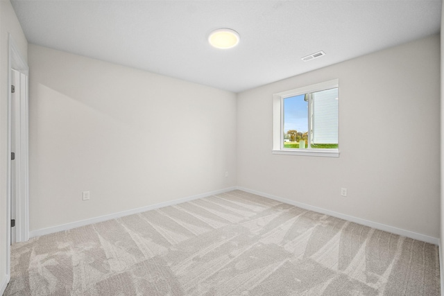 4400 Honey Bee Rdg, Des Moines, IA 50317 - carpeted spare room with baseboards