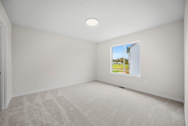 4400 Honey Bee Rdg, Des Moines, IA 50317 - unfurnished room featuring carpet floors and baseboards