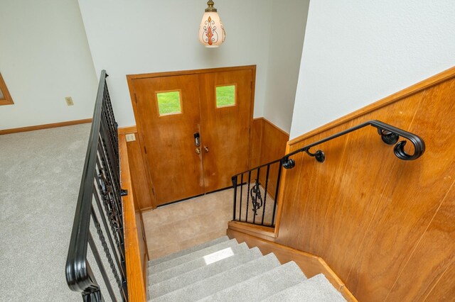 108 56th St, Des Moines, IA 50312 - carpeted entrance foyer featuring stairway