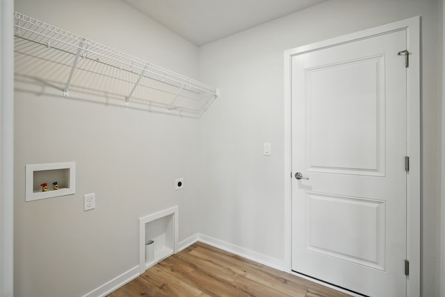 1819 Tuscany Dr SE, Altoona, IA 50009 - washroom with hookup for an electric dryer, hookup for a washing machine, and wood finished floors