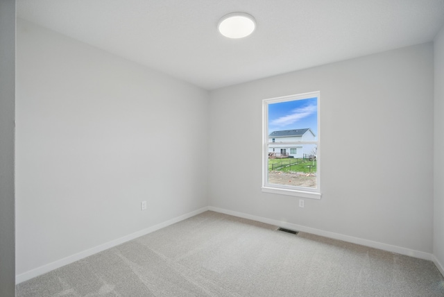 1819 Tuscany Dr SE, Altoona, IA 50009 - unfurnished room featuring light colored carpet