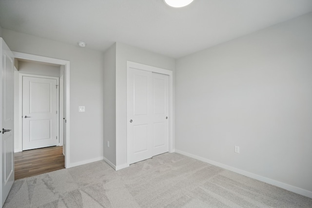 1819 Tuscany Dr SE, Altoona, IA 50009 - unfurnished bedroom featuring carpet flooring and a closet