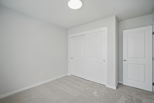 1819 Tuscany Dr SE, Altoona, IA 50009 - unfurnished bedroom with carpet floors and a closet