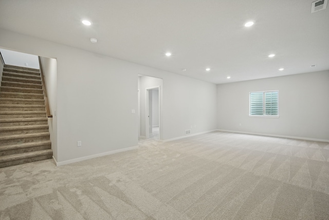 1819 Tuscany Dr SE, Altoona, IA 50009 - unfurnished room featuring light colored carpet, recessed lighting, and stairway