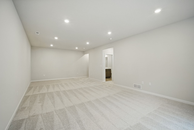 1819 Tuscany Dr SE, Altoona, IA 50009 - unfurnished room with light carpet and recessed lighting