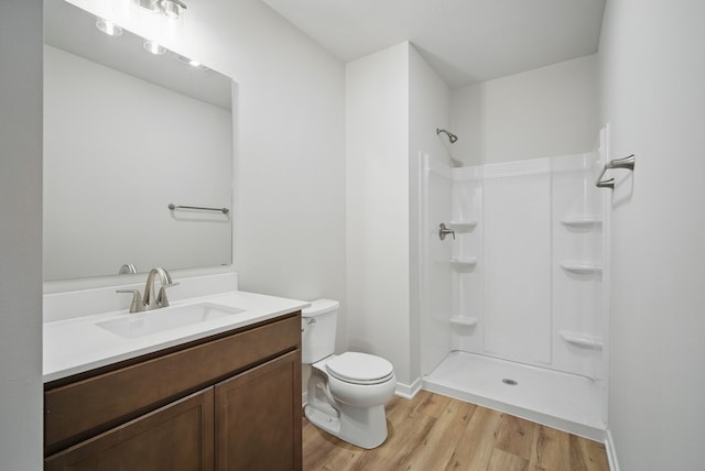 1819 Tuscany Dr SE, Altoona, IA 50009 - bathroom with wood finished floors, vanity, and a shower