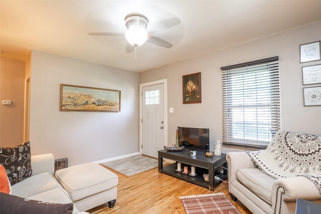 3913 Lawnwoods Dr, Des Moines, IA 50310 - living area with ceiling fan and light wood-style floors