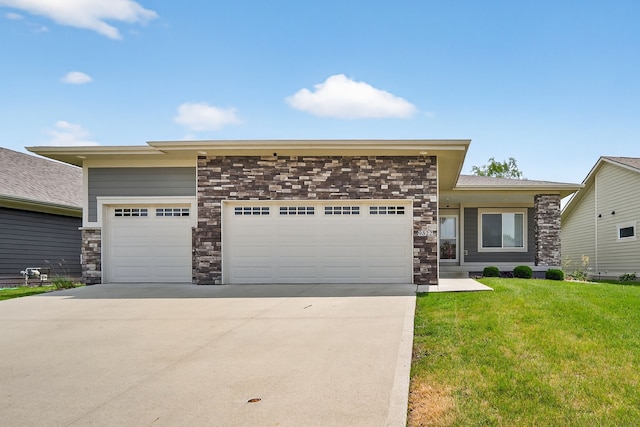 9322 Bellflower Ln, Norwalk, IA 50211 - view of front facade with an attached garage, concrete driveway, a front lawn, and stone siding