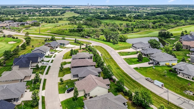 9322 Bellflower Ln, Norwalk, IA 50211 - aerial perspective of suburban area featuring a nearby body of water and a local golf course