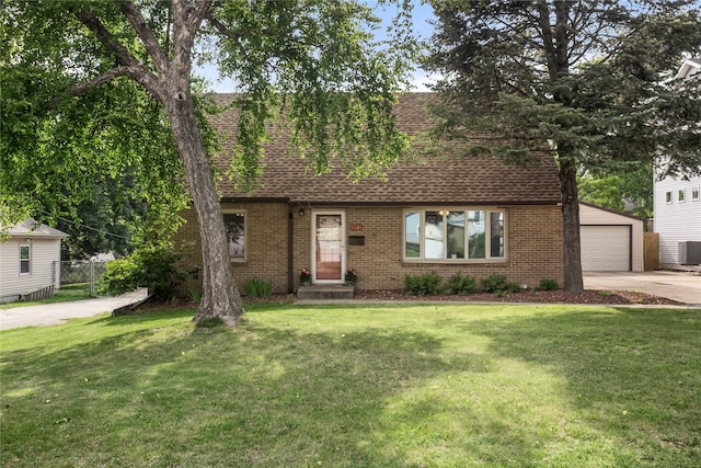 1034 66th St, Windsor Heights, IA 50324 - view of front of property with a shingled roof, brick siding, and concrete driveway
