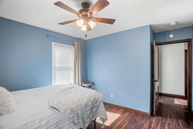 1034 66th St, Windsor Heights, IA 50324 - bedroom with wood finished floors and ceiling fan