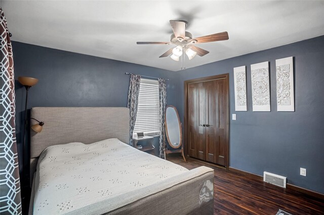 1034 66th St, Windsor Heights, IA 50324 - bedroom featuring wood finished floors, a ceiling fan, and a closet