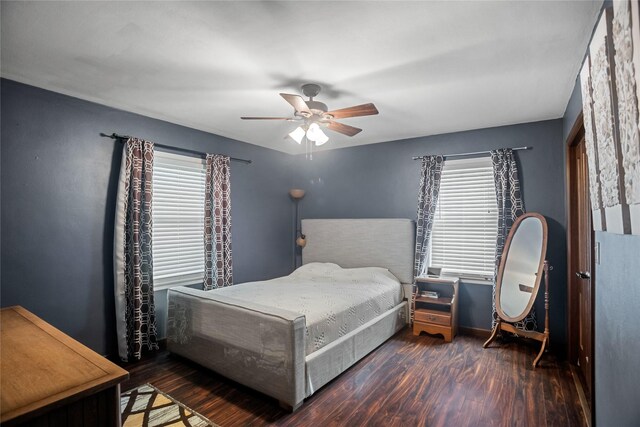 1034 66th St, Windsor Heights, IA 50324 - bedroom with wood finished floors and a ceiling fan