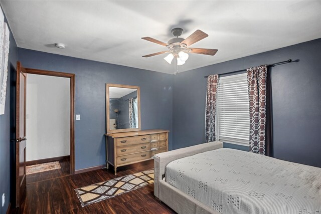 1034 66th St, Windsor Heights, IA 50324 - bedroom featuring dark wood-style flooring and a ceiling fan