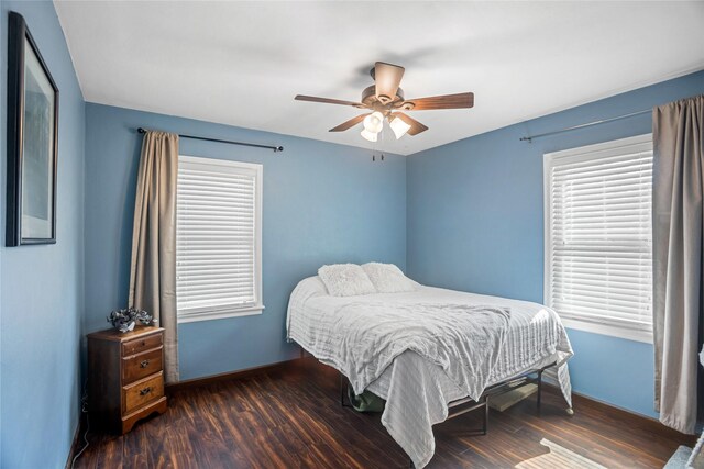 1034 66th St, Windsor Heights, IA 50324 - bedroom featuring wood finished floors and a ceiling fan