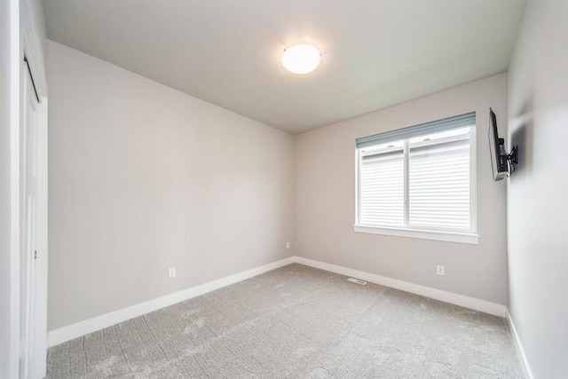 1636 S Redtail Ave, West Des Moines, IA 50265 - empty room with light colored carpet