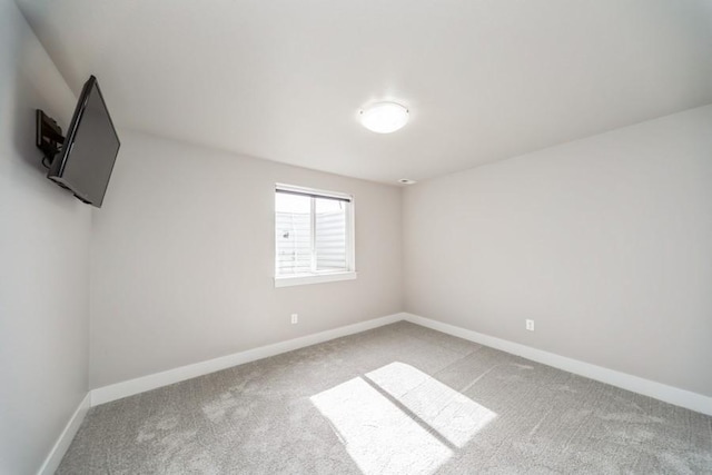 1636 S Redtail Ave, West Des Moines, IA 50265 - empty room with light carpet and baseboards