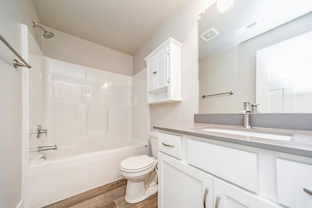 1636 S Redtail Ave, West Des Moines, IA 50265 - full bath featuring wood finished floors, vanity, and shower / tub combination