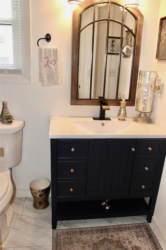 111 S 3rd Ave, Huxley, IA 50124 - bathroom with vanity and marble finish flooring
