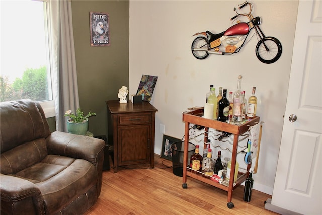 111 S 3rd Ave, Huxley, IA 50124 - sitting room featuring light wood-style floors and a dry bar