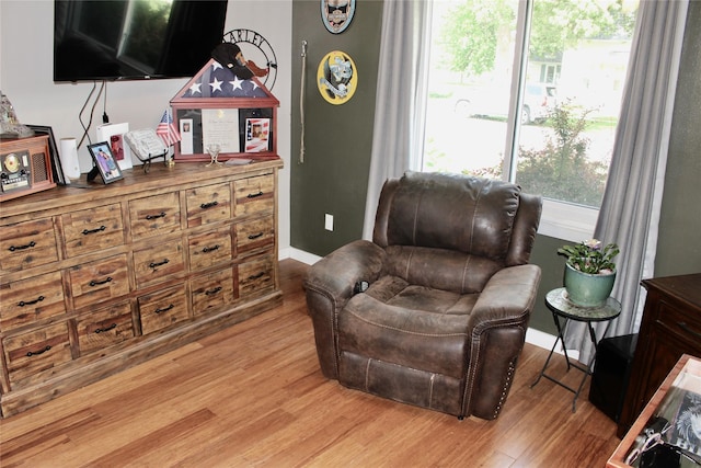 111 S 3rd Ave, Huxley, IA 50124 - sitting room with light wood finished floors