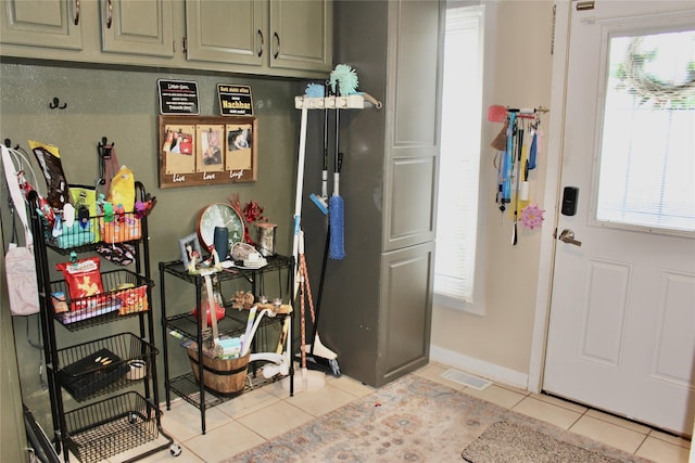 111 S 3rd Ave, Huxley, IA 50124 - entryway featuring light tile patterned floors and plenty of natural light