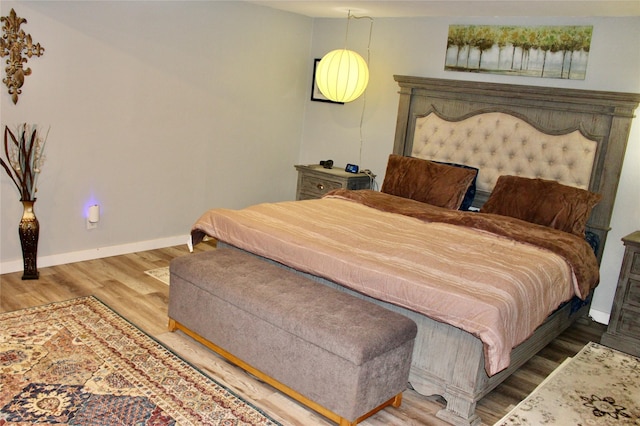 111 S 3rd Ave, Huxley, IA 50124 - bedroom with wood finished floors and baseboards